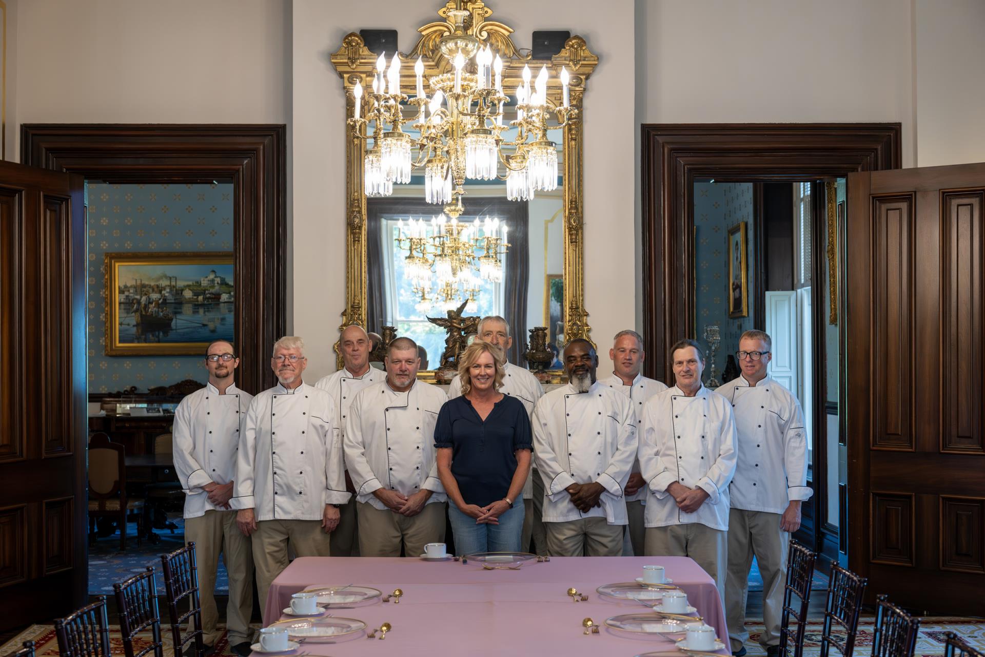 First Lady Claudia Kehoe poses with the group.